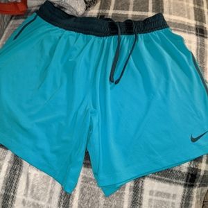 Woman's long Nike DRI fit shorts size medium